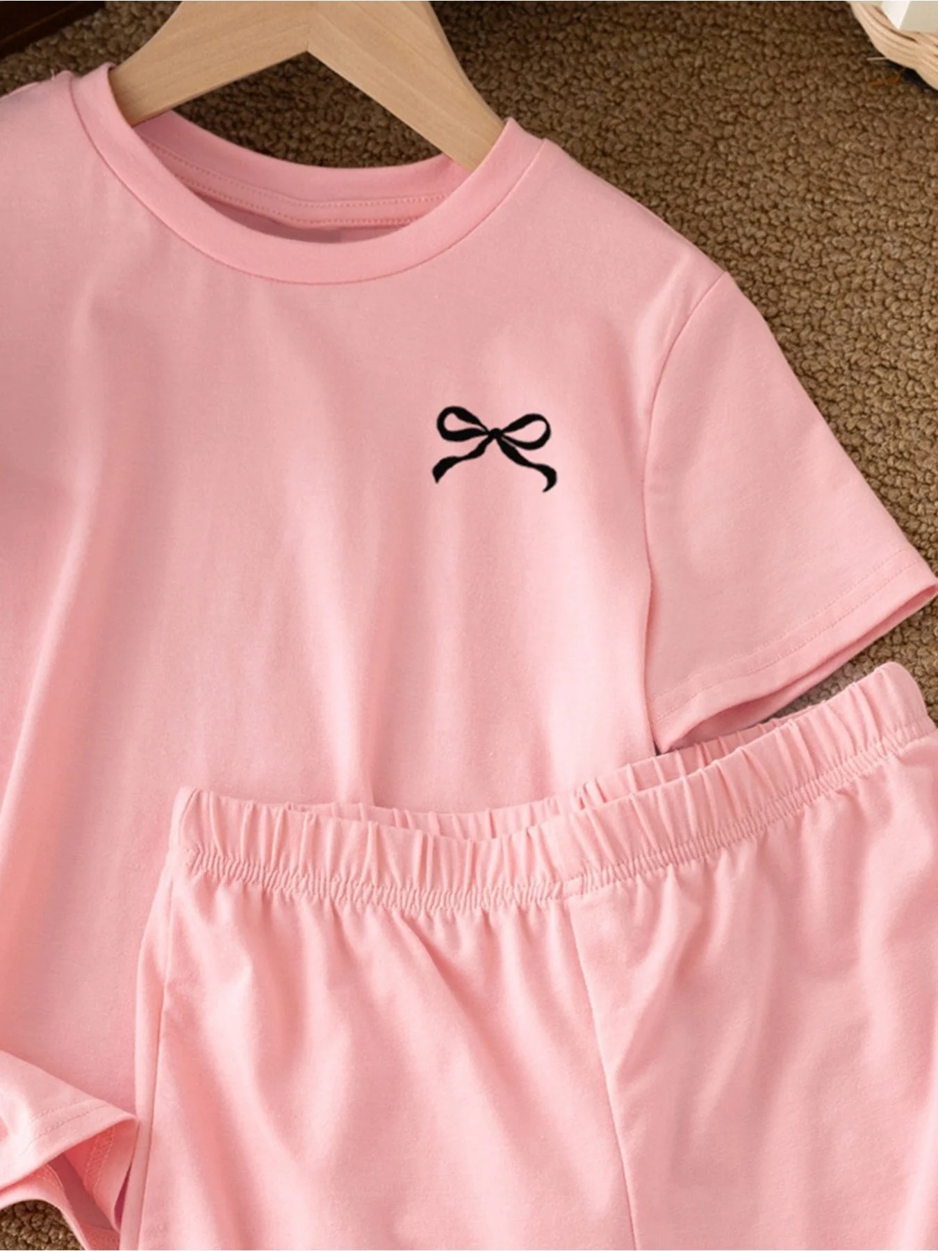 2026 Casual Children's Clothing Solid Color Printed Round Neck Short Sleeved Top + Solid Color Printed Wide Leg Shorts Pants Set