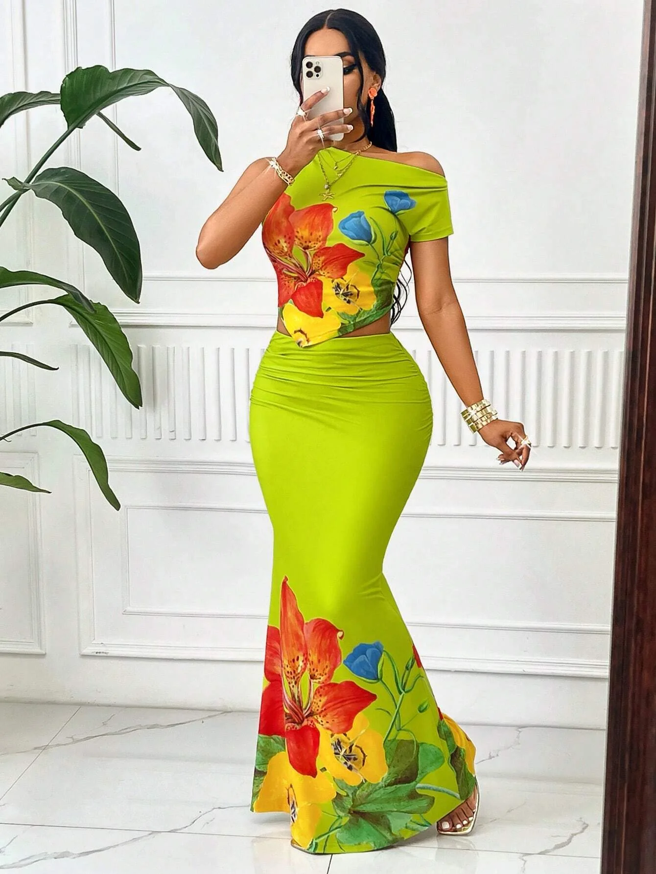Elegant Women's Summer Fashion Two-piece Set: Bright Floral Print Sleeveless Top and Casual Resort Extra-long Skirt Beachwear