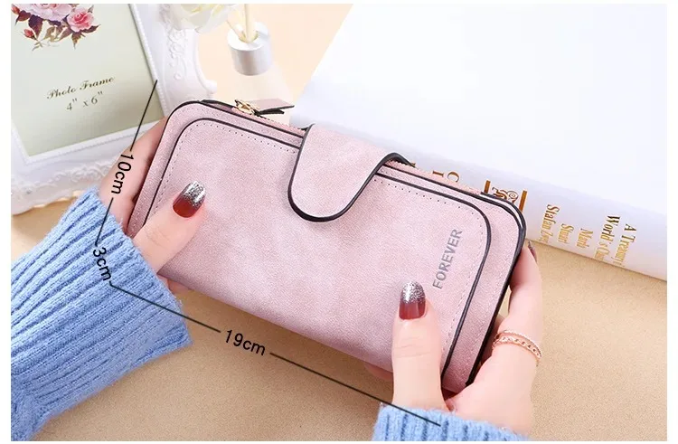 The new design is a highlight Women's Long Wallet features multiple card slots a coin pocket and a cell phone pouch Perfect gift
