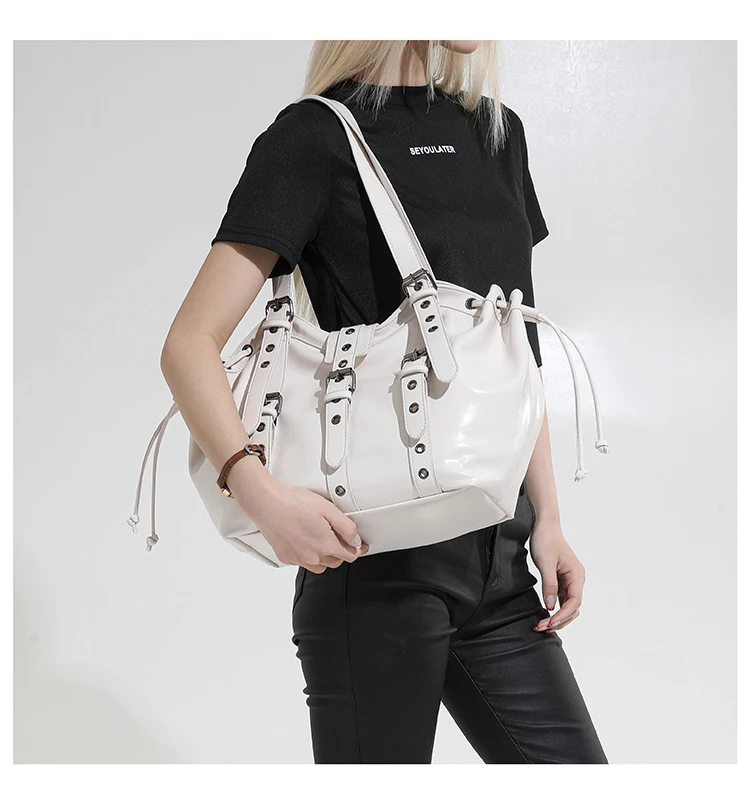 2026 New PU Hobo Tote for Women Y2K Gothic Rivet Adjustable Strap Shoulder Bag Large Capacity Drawstring Handbag for Daily Use
