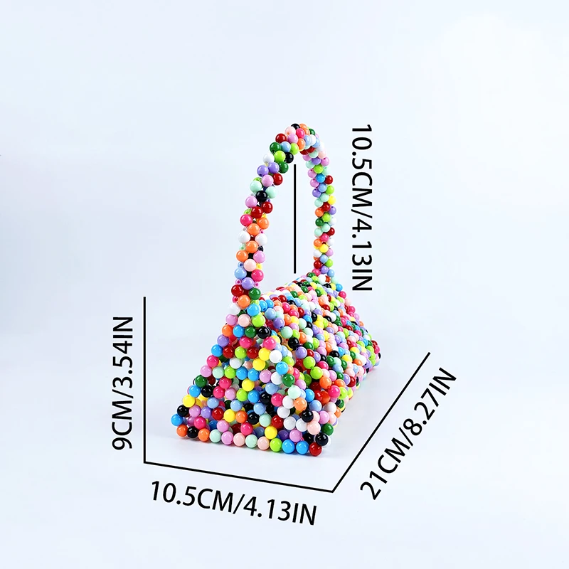 European and American same niche handmade color-blocked pearl triangle bag, fashionable and versatile hand-held bead bag