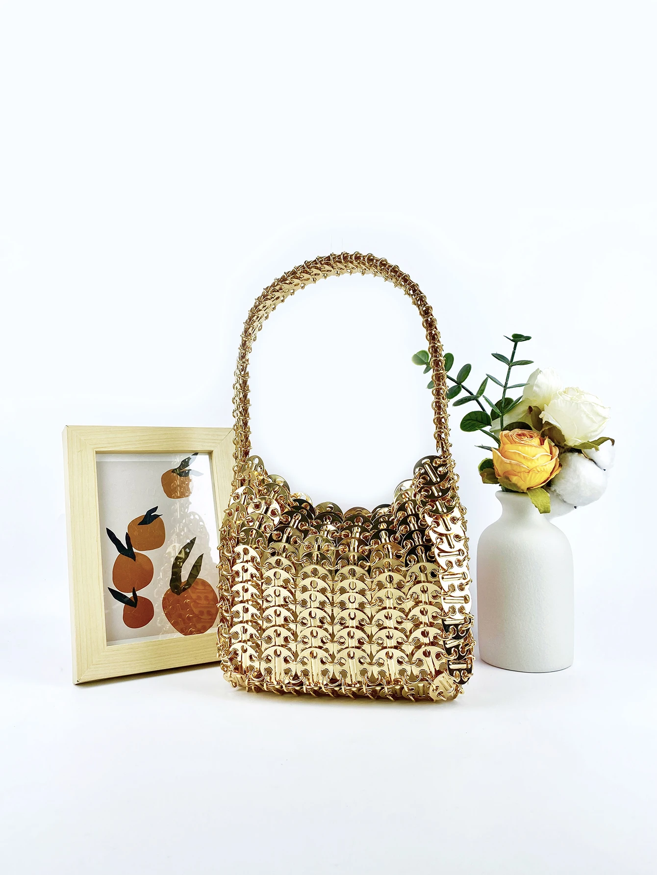 Hot selling fashion Korean version gold aluminum sheet, niche, high-quality, temperament, versatile woven handbag