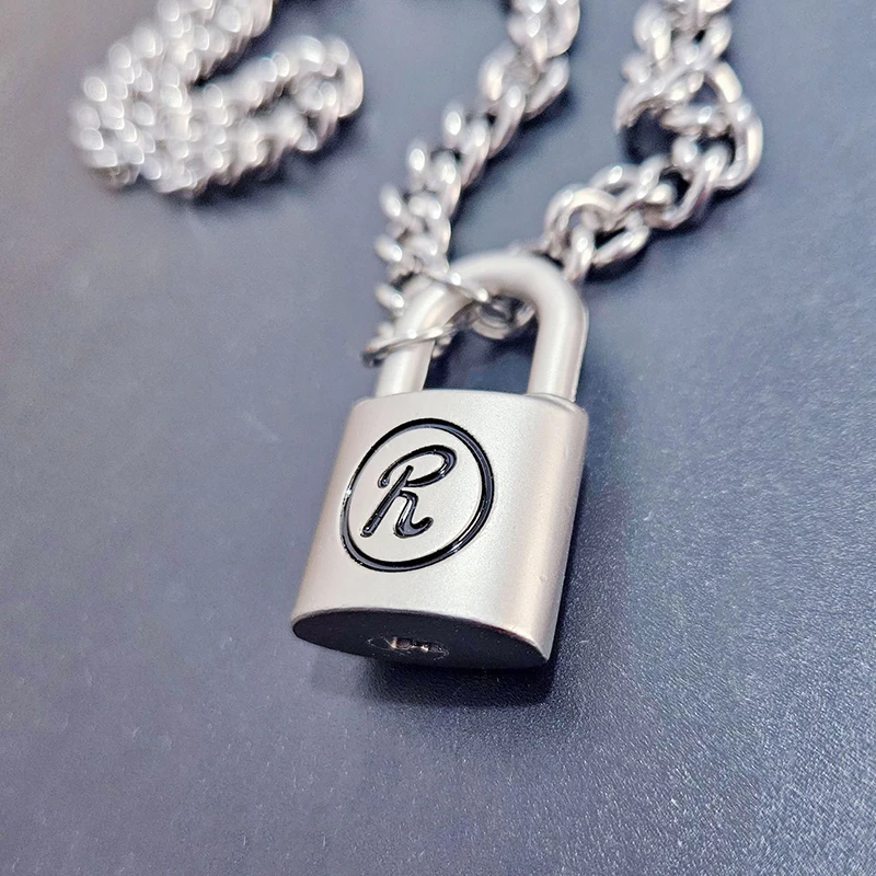 Unique design novel shape glossy and Simpli silvery keylock men pendant charms black border letter R necklace gentleman's jewelr