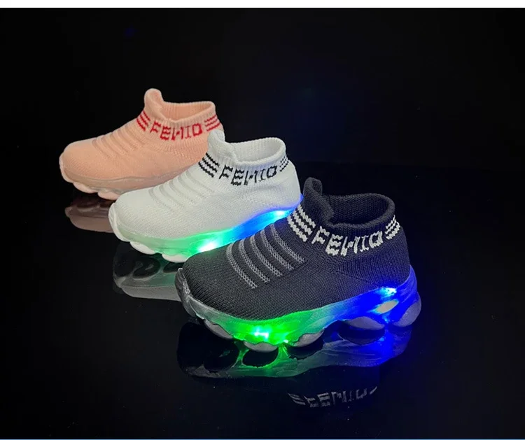 Boys and girls' flying woven sports socks and shoes with LED lights, summer new breathable and elastic children's shoes