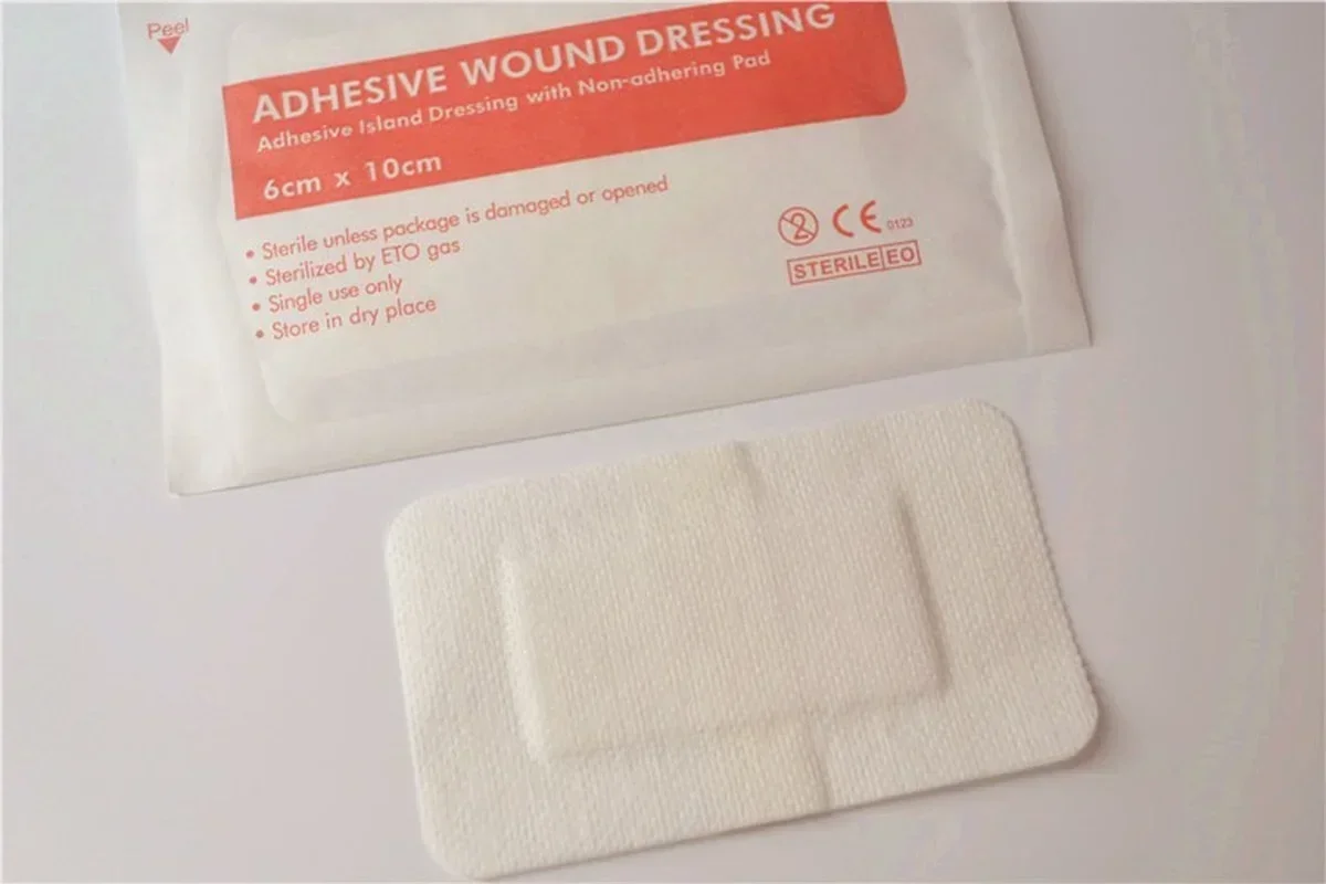 10pcs 6*10cm Non-woven Medical Adhesive Hemostasis Plaster Wounds Dressing Band Aid Bandage Sterilization Wound First Aid Tool