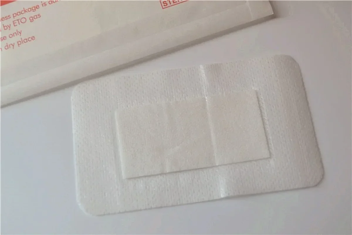 10pcs 6*10cm Non-woven Medical Adhesive Hemostasis Plaster Wounds Dressing Band Aid Bandage Sterilization Wound First Aid Tool