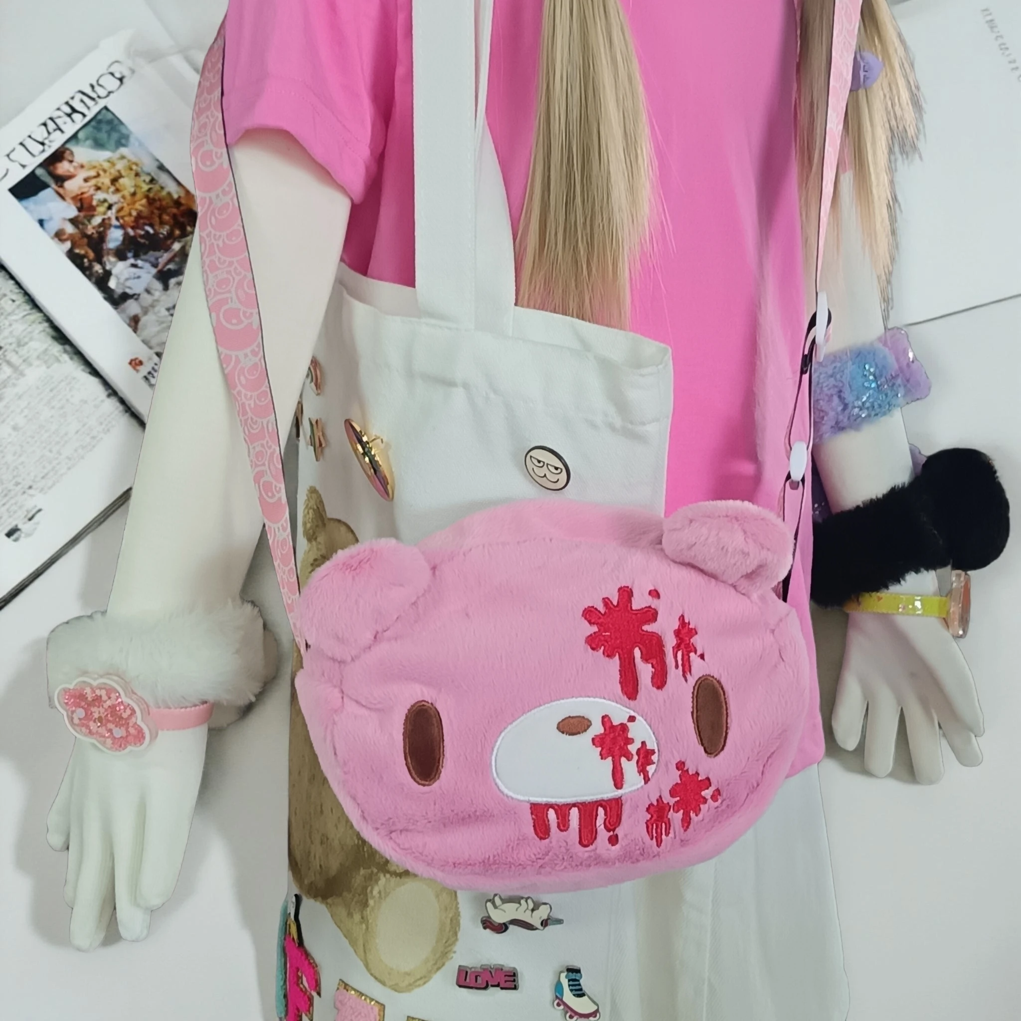 Gloomy Bear plush crossbody bag: Pink, cute - edgy with “blood - splatter” details. A fun, unique pick for fans.