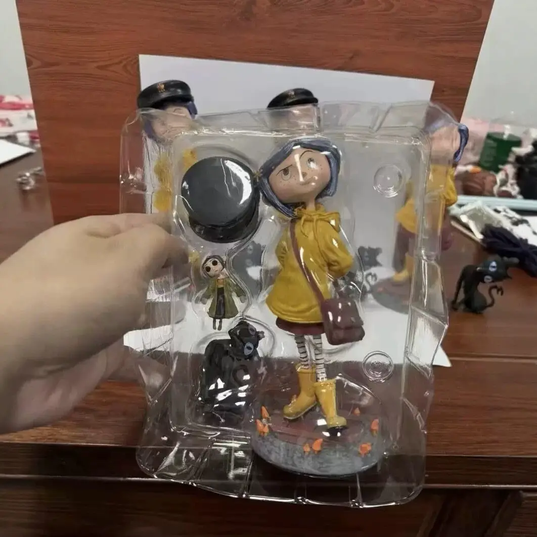 Coraline Action Figure 7 Inch Movie Version Yellow Raincoat Collectible Pvc Model Decor For Collection Enthusiasts Ideal Gift