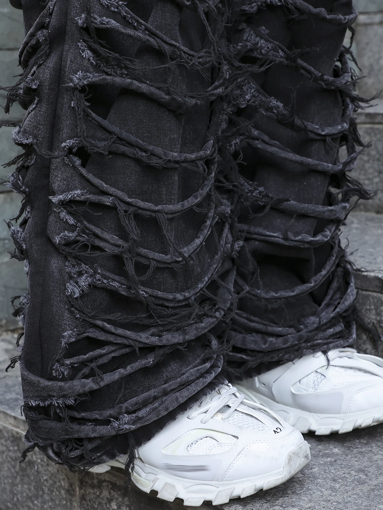 Men's Black Jeans. With a Design of (Ripped Holes) and Tassels. In a Street Trend Style.