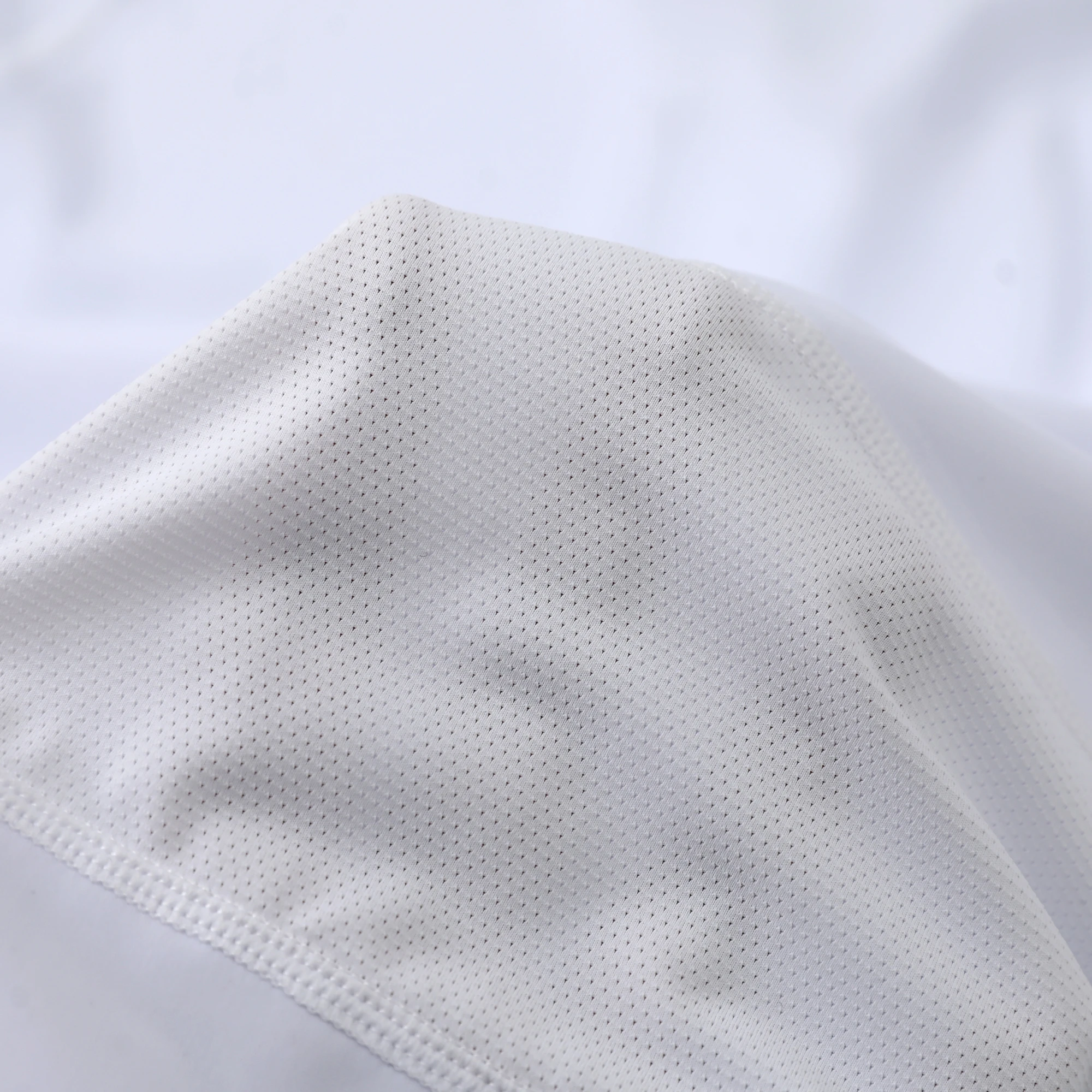 Taekwondo Competition Uniforms Feature Professional Stretch Design and Breathable Mesh Logo Prints for Both Children and Adults