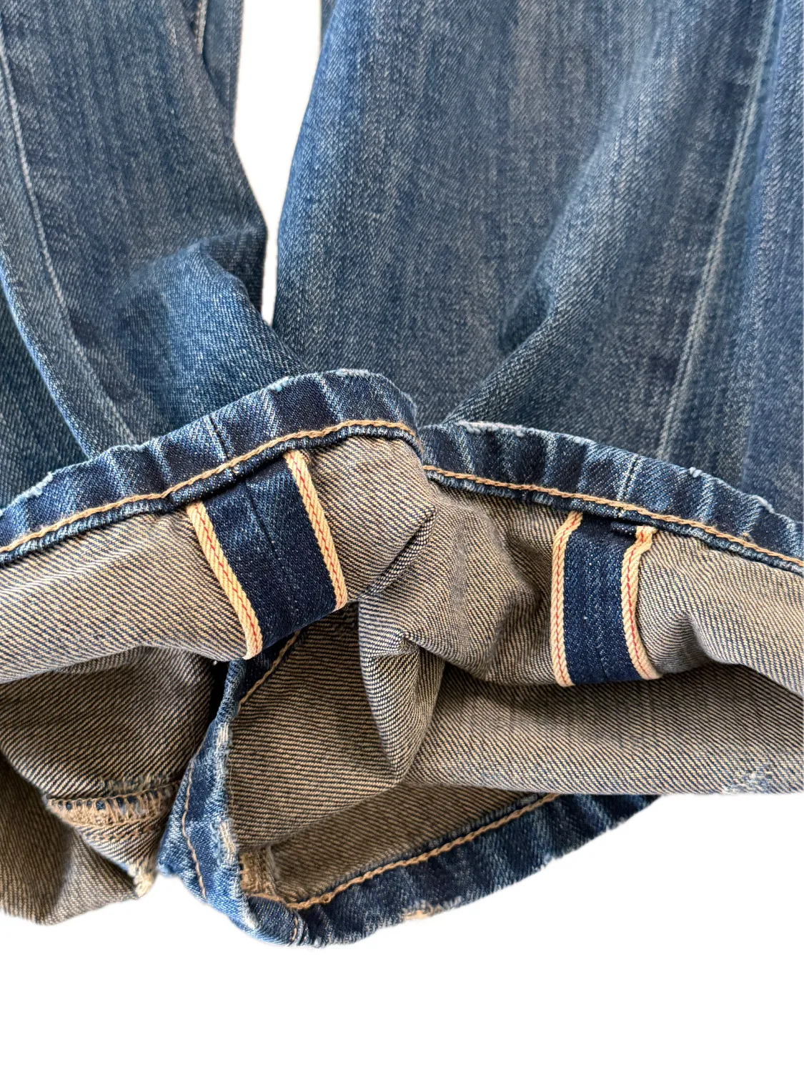 Button‑Fly Cat‑Whisker Pleated Indigo Selvedge Bootcut Jeans