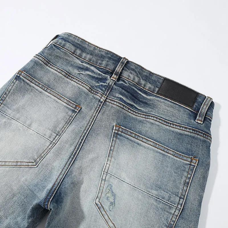Designer Fashion New Men's Jeans Ripple Elastic Slimming Wash Retro Light Blue Perforated Patch Jeans High Street Hip Hop Pants