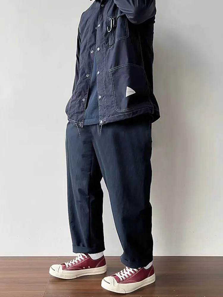 23SS Japanese Casual Loose Quick Drying Tapered Nine Point Casual Pants for Men and Women