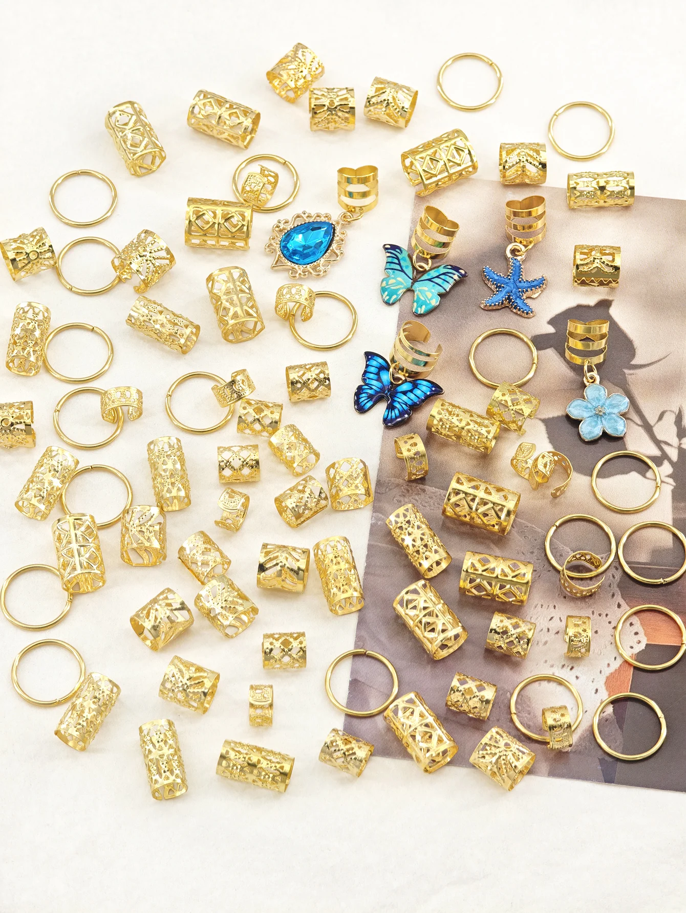56pcs Vibrant Garden Hair Rings with Blue & Green Butterflies, White Daisies and Blue Camellias and Elegant Adjustable Cuffs