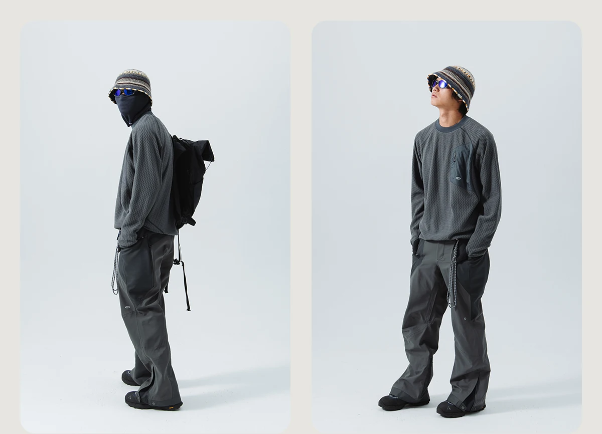 Mountain-Ready Crewneck: Engineered with Ribbed Neck, Reflective Logo, & Secure Chest Pocket for Outdoor Style Unisex