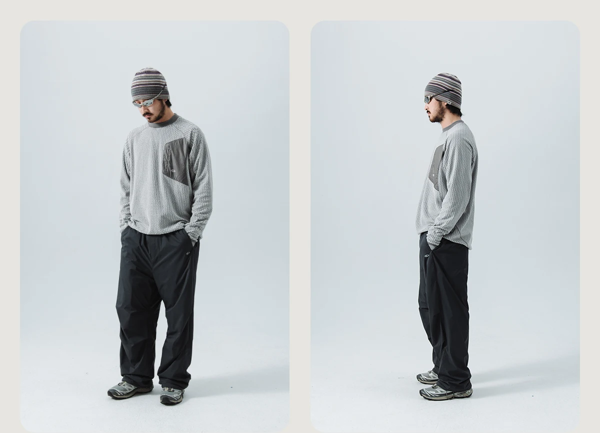 Mountain-Ready Crewneck: Engineered with Ribbed Neck, Reflective Logo, & Secure Chest Pocket for Outdoor Style Unisex