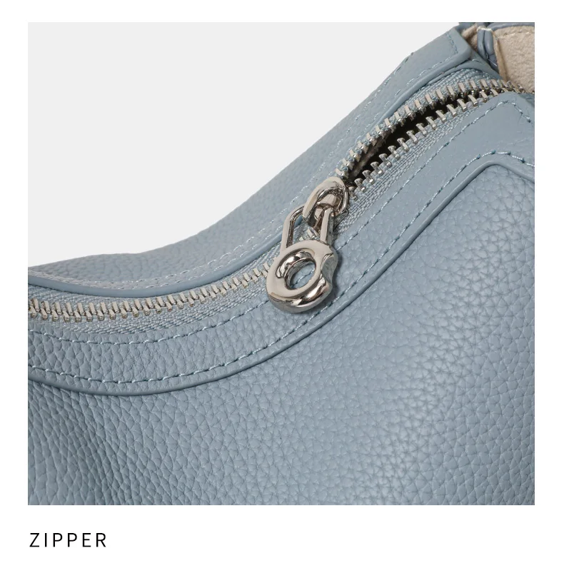 The First Layer of Cowhide Underarm Shoulder Bag 2026 New Niche Design Minimalist Blue Fashion Soft Leather Hand Saddle Bag