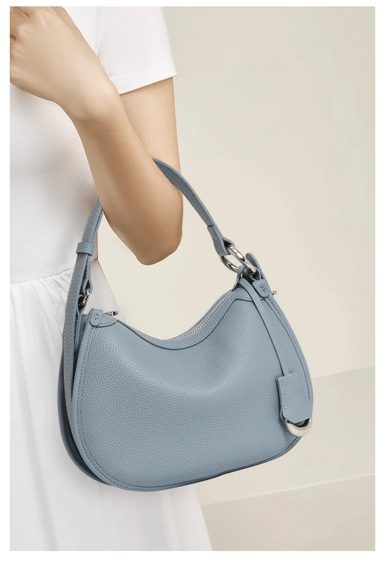 The First Layer of Cowhide Underarm Shoulder Bag 2026 New Niche Design Minimalist Blue Fashion Soft Leather Hand Saddle Bag