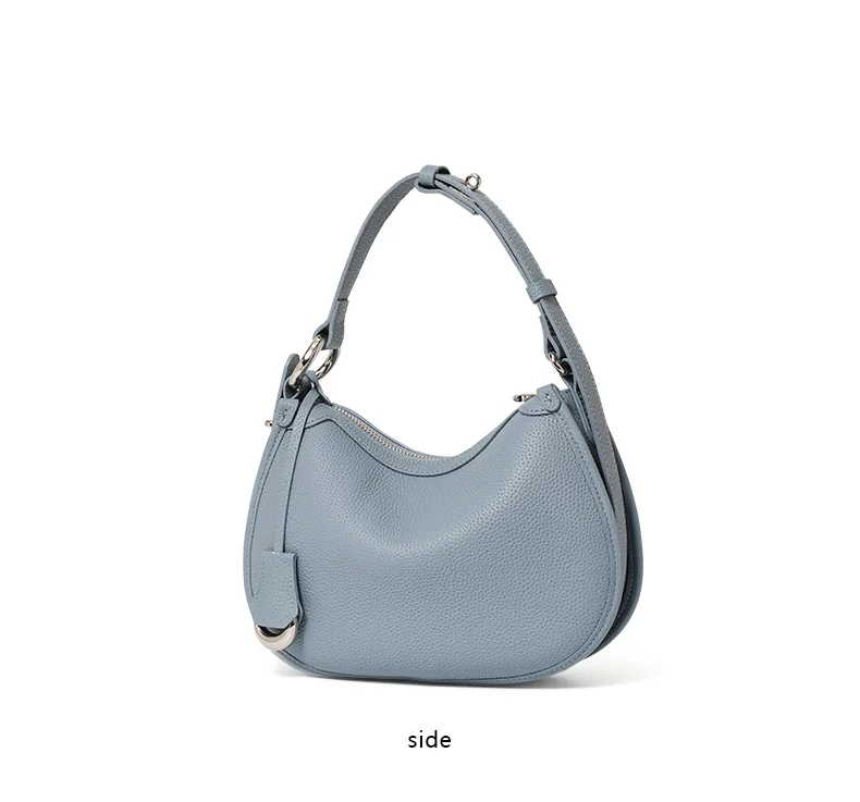 The First Layer of Cowhide Underarm Shoulder Bag 2026 New Niche Design Minimalist Blue Fashion Soft Leather Hand Saddle Bag