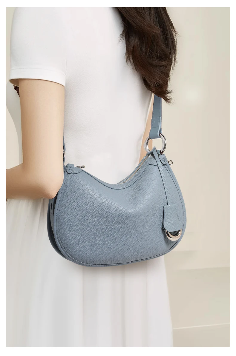 The First Layer of Cowhide Underarm Shoulder Bag 2026 New Niche Design Minimalist Blue Fashion Soft Leather Hand Saddle Bag