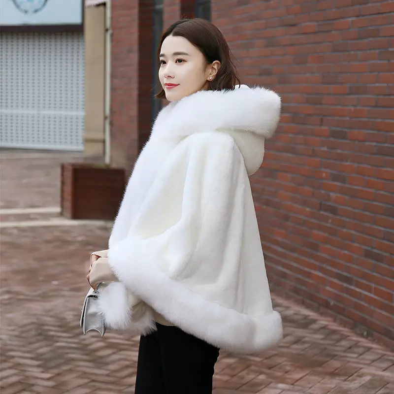 Women's new winter faux fur shawl cape style short Haining faux fox fur thick hooded windbreaker women jacket coats for women