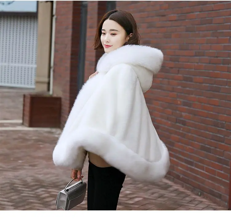 Women's new winter faux fur shawl cape style short Haining faux fox fur thick hooded windbreaker women jacket coats for women