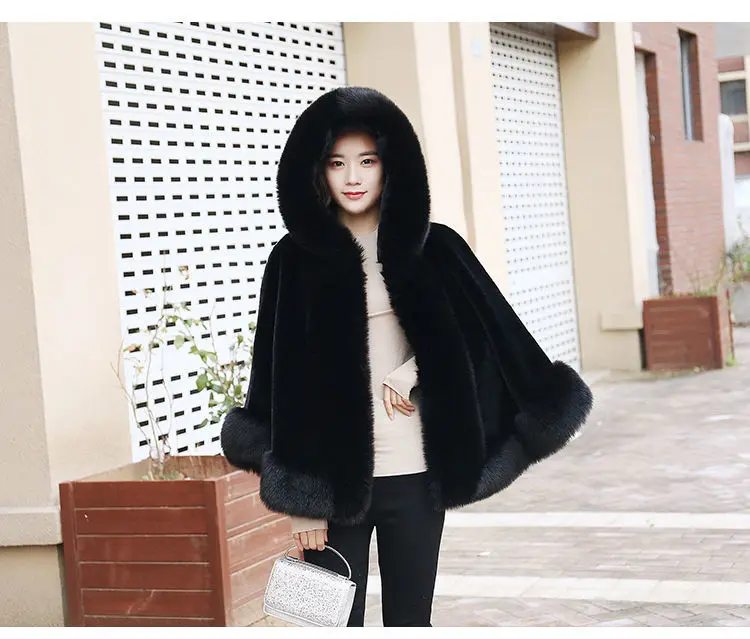 Women's new winter faux fur shawl cape style short Haining faux fox fur thick hooded windbreaker women jacket coats for women