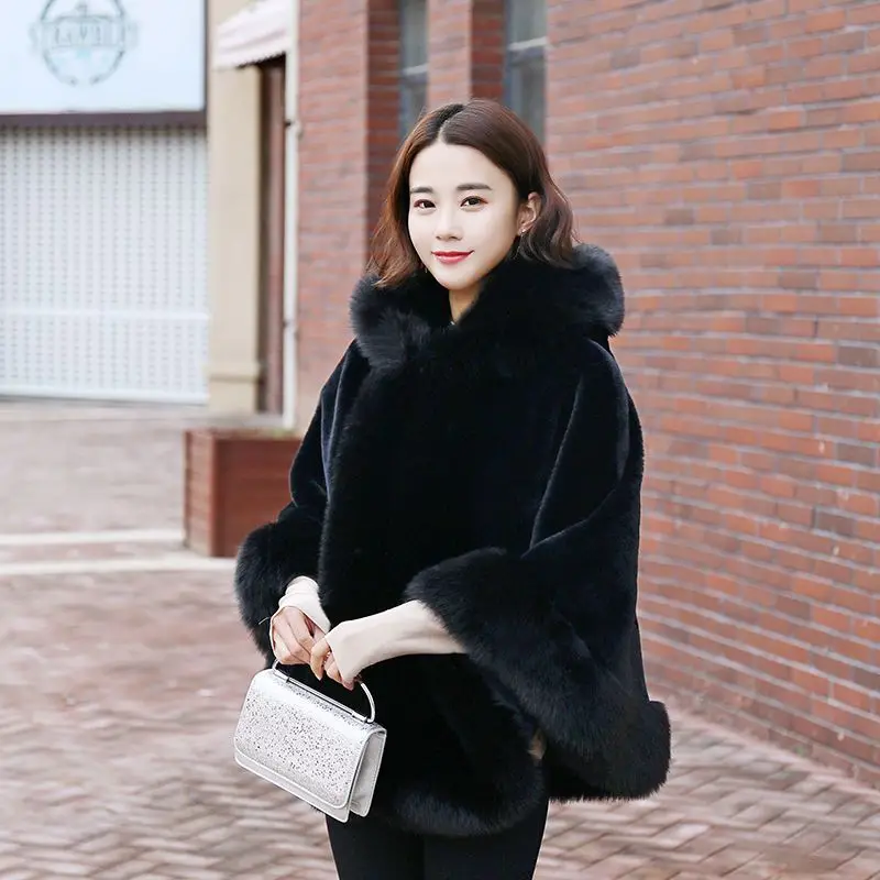 Women's new winter faux fur shawl cape style short Haining faux fox fur thick hooded windbreaker women jacket coats for women