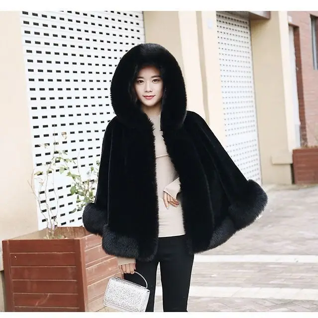 Women's new winter faux fur shawl cape style short Haining faux fox fur thick hooded windbreaker women jacket coats for women