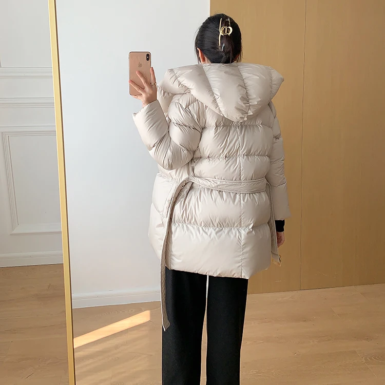 Lagabogy 2025 New Winter Women Hooded Thick Loose 90% White Duck Down Jacket Female Elegant Lightweight Puffer Coat With Belt