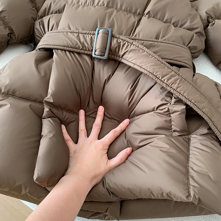 Lagabogy 2025 New Winter Women Hooded Thick Loose 90% White Duck Down Jacket Female Elegant Lightweight Puffer Coat With Belt