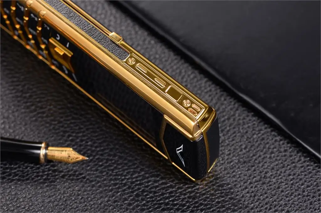 Luxury V10 Phone with Metal Leather Body Dual Card Slot Invisible Keyboard FM Radio And Camera - Premium Unisex Design