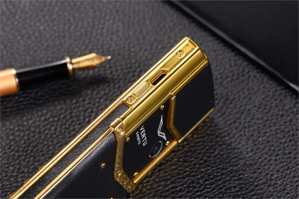 Luxury V10 Phone with Metal Leather Body Dual Card Slot Invisible Keyboard FM Radio And Camera - Premium Unisex Design