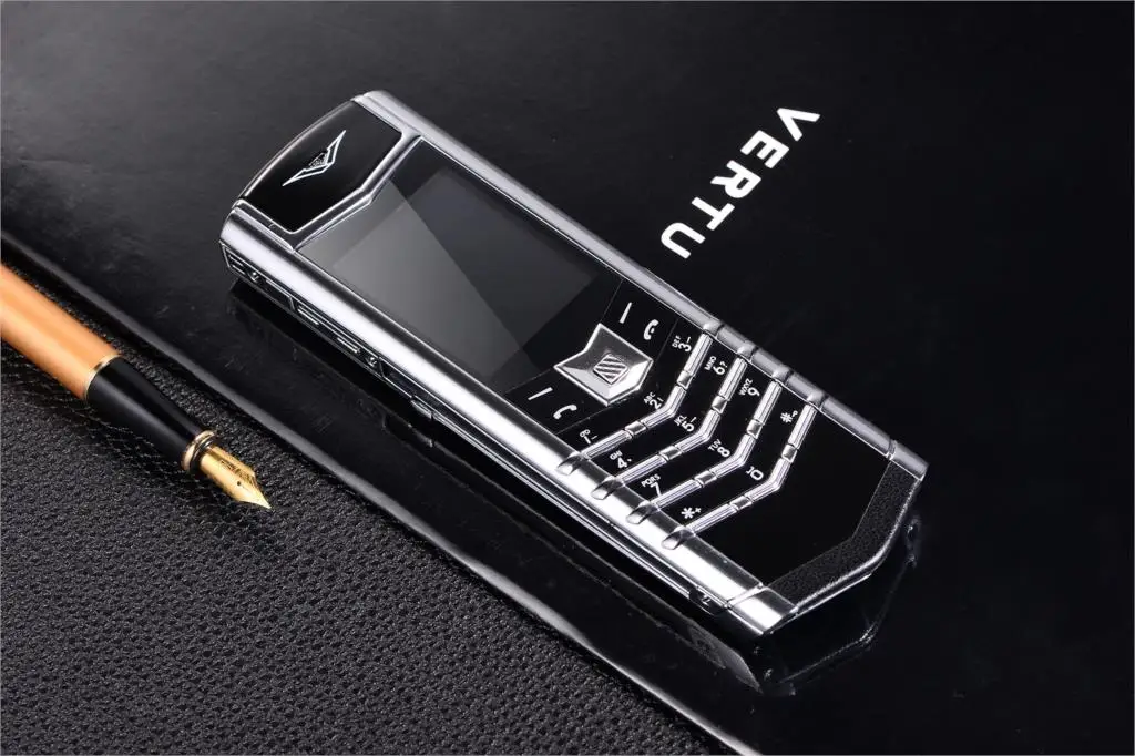 Luxury V10 Phone with Metal Leather Body Dual Card Slot Invisible Keyboard FM Radio And Camera - Premium Unisex Design