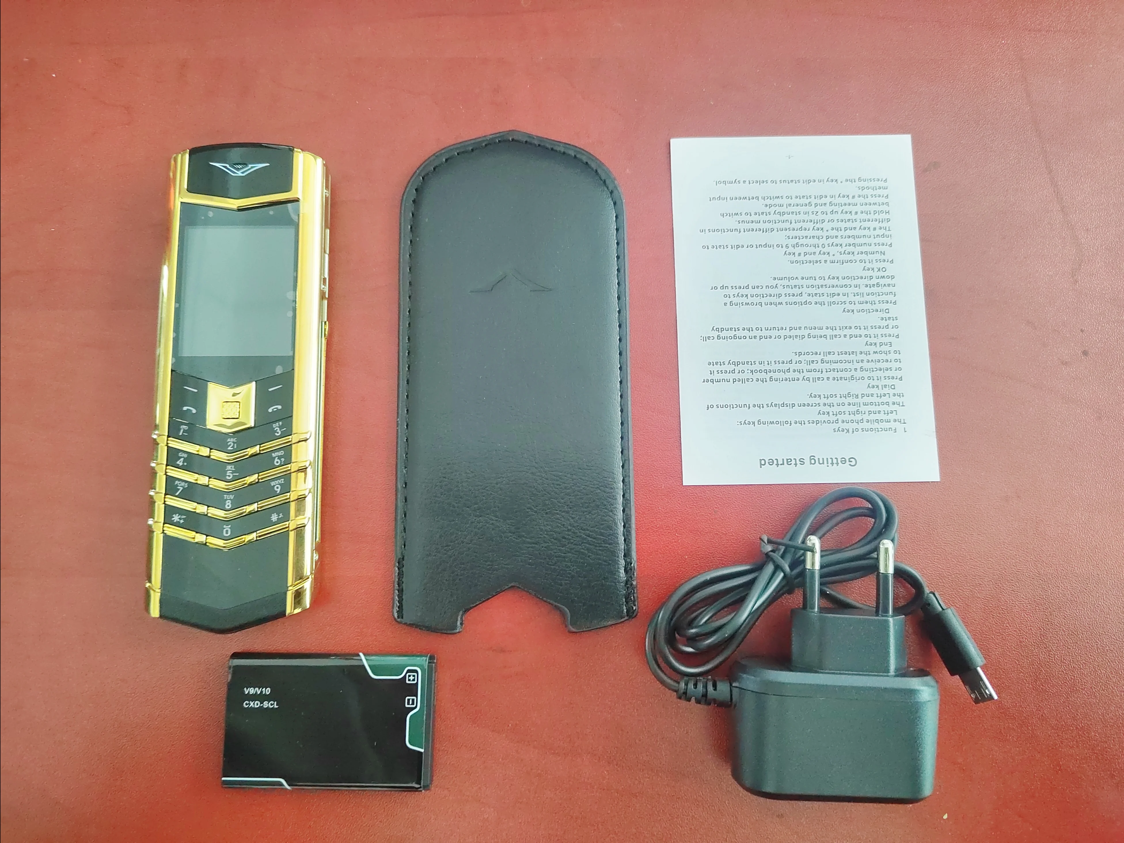 Luxury V10 Phone with Metal Leather Body Dual Card Slot Invisible Keyboard FM Radio And Camera - Premium Unisex Design