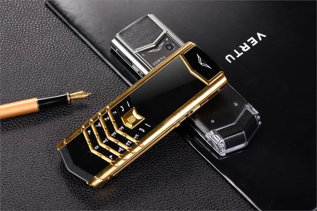 Luxury V10 Phone with Metal Leather Body Dual Card Slot Invisible Keyboard FM Radio And Camera - Premium Unisex Design