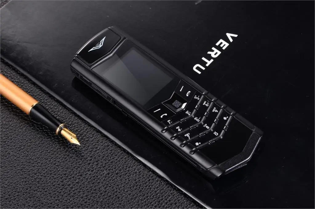 Luxury V10 Phone with Metal Leather Body Dual Card Slot Invisible Keyboard FM Radio And Camera - Premium Unisex Design