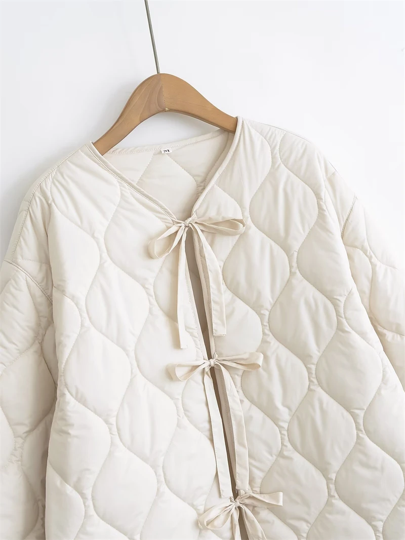 KEYANKETIAN 2024 Autumn/Winter New Women's Bow Lace-up Quilted Cotton Jacket Leisure style Asymmetrical Loose Thin Outerwear