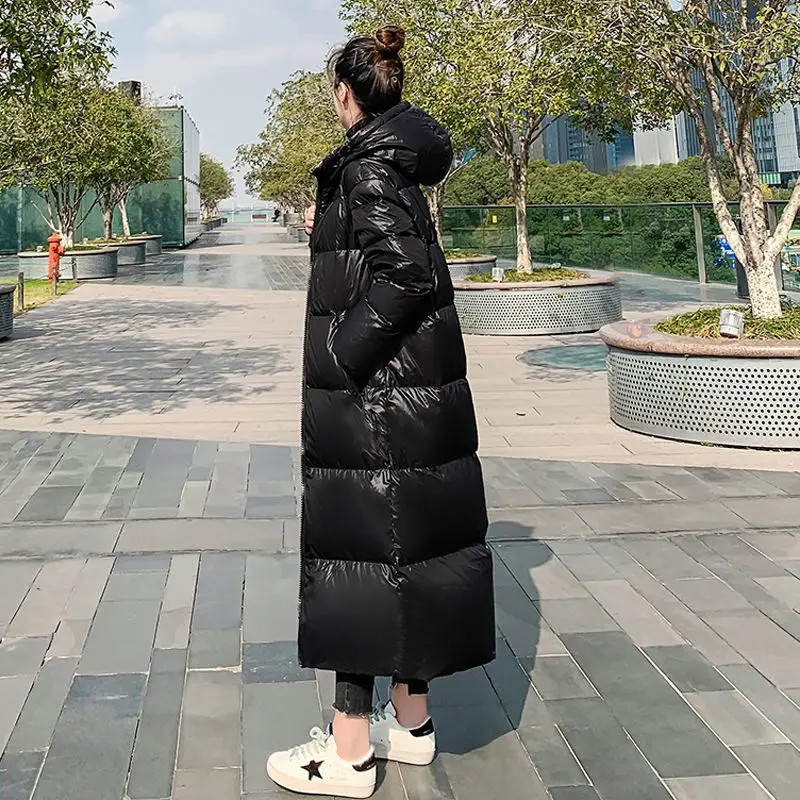 2026 New Thicken Snow Parkas Fashion Windproof Glossy Down Cotton Hooded Women Jacket Winter Loose Long Coat 4XL Ladies Outwear