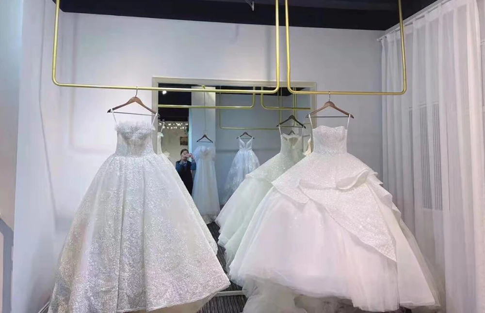 Smileven 3D Lace Flowers Wedding Dresses Champlgne Spaghetti Strao Bride Dresses Kenn Length Vestido de novia 2026 Customized