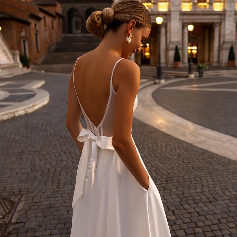 Elegant Long V Neck Satin Plus Size Wedding Dresses Sleeveless with Bow A Line Sweep Train Bridal Gown for Women