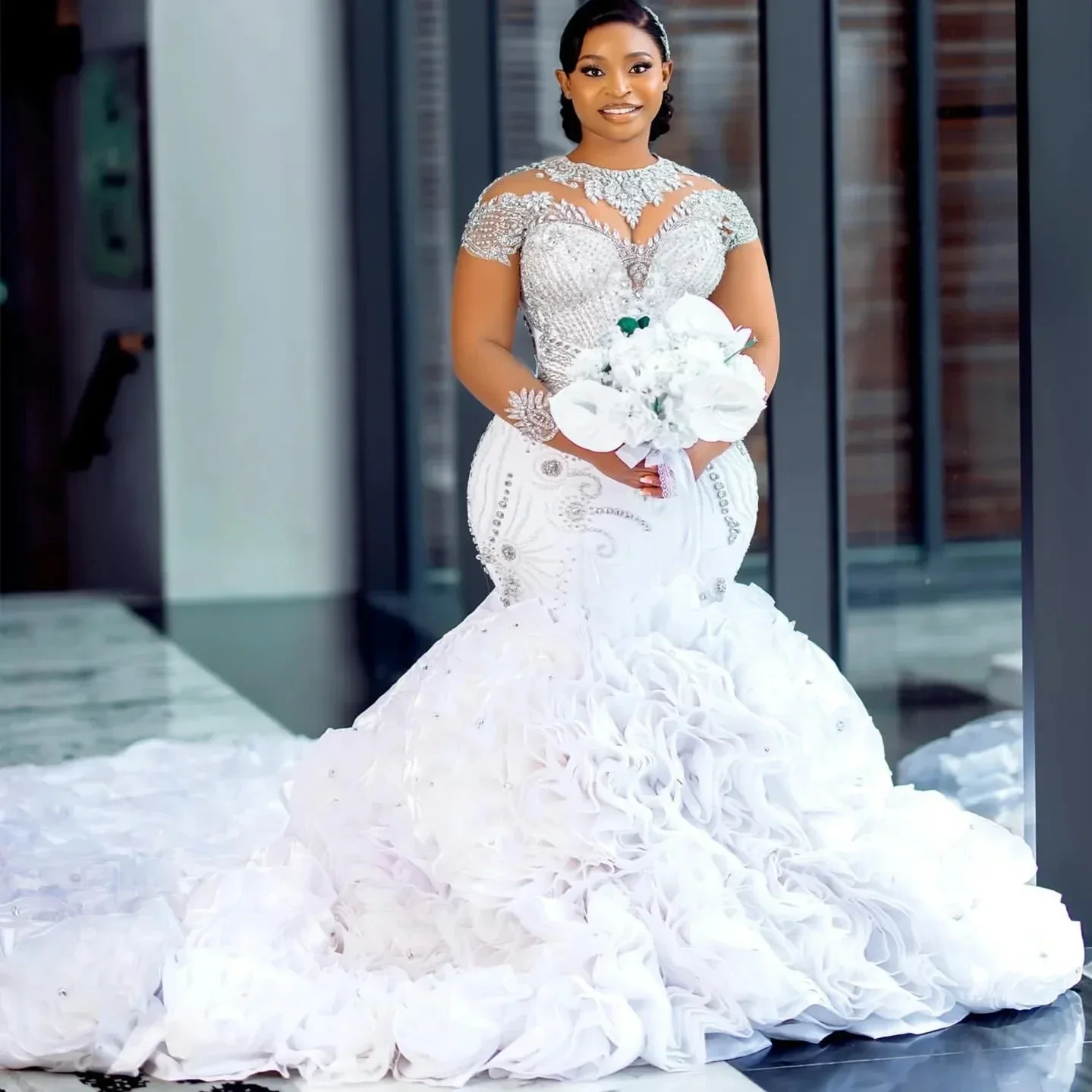 African Mermaid Wedding Dresses 2026 Luxury Shinny Crystals Bead Mesh Long Sleeves with Rufflues Train Bridal Gowns Customized