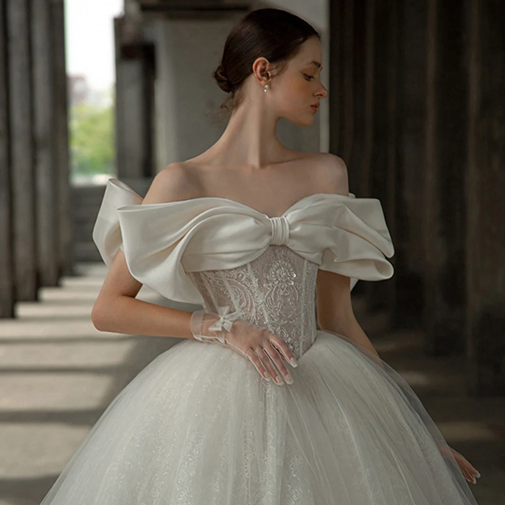 Off The Shoulder Sweetheart Neck Shiny Beading Pearls Bow Tulle Lace Bow Ball Gown Wedding Dresses With 100cm Chapel Train