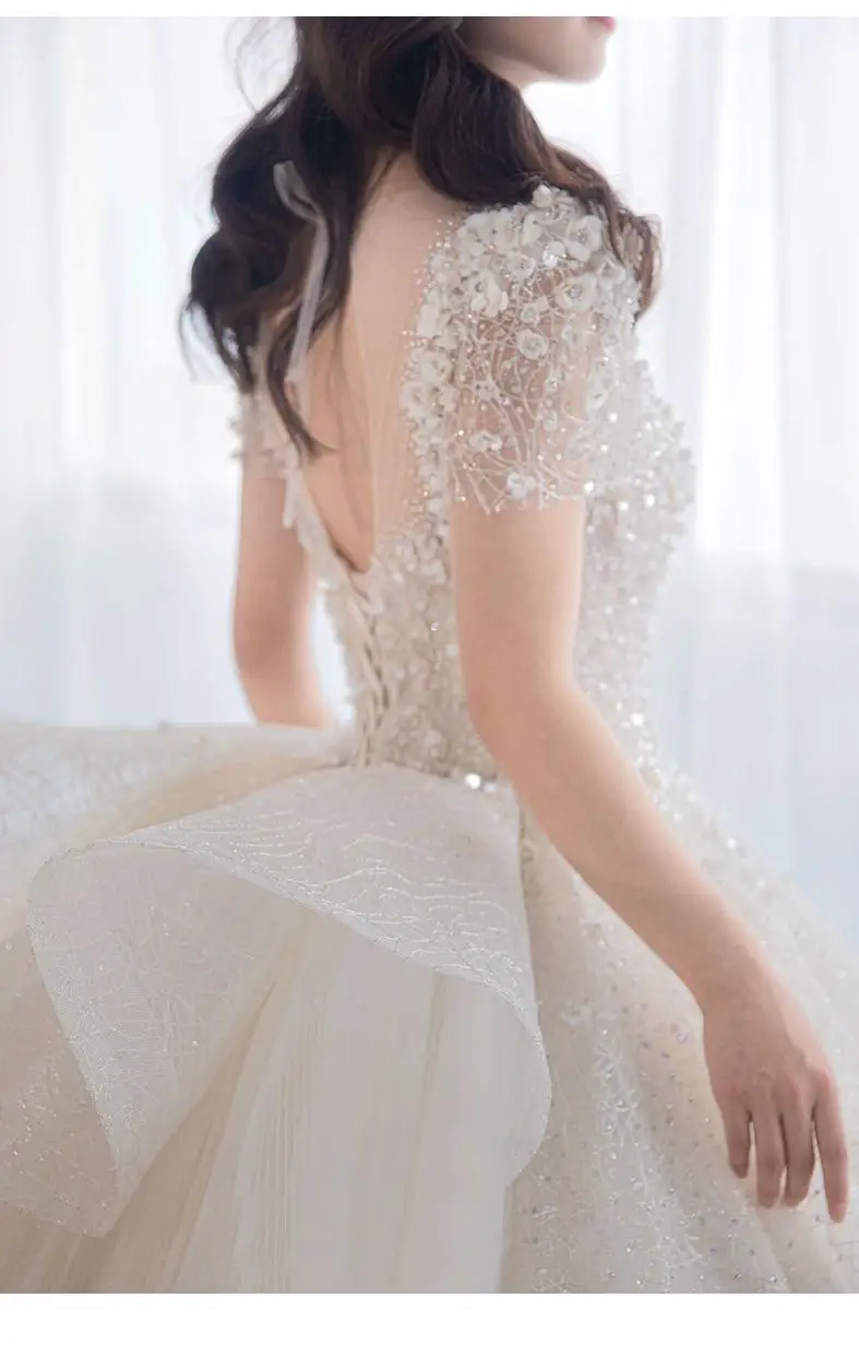 Luxury Short Sleeve Wedding Dress 2026 New Bridal Dress V Neck Beading Shinning Ball Gown Sweep Train Vestido Noiva Customized