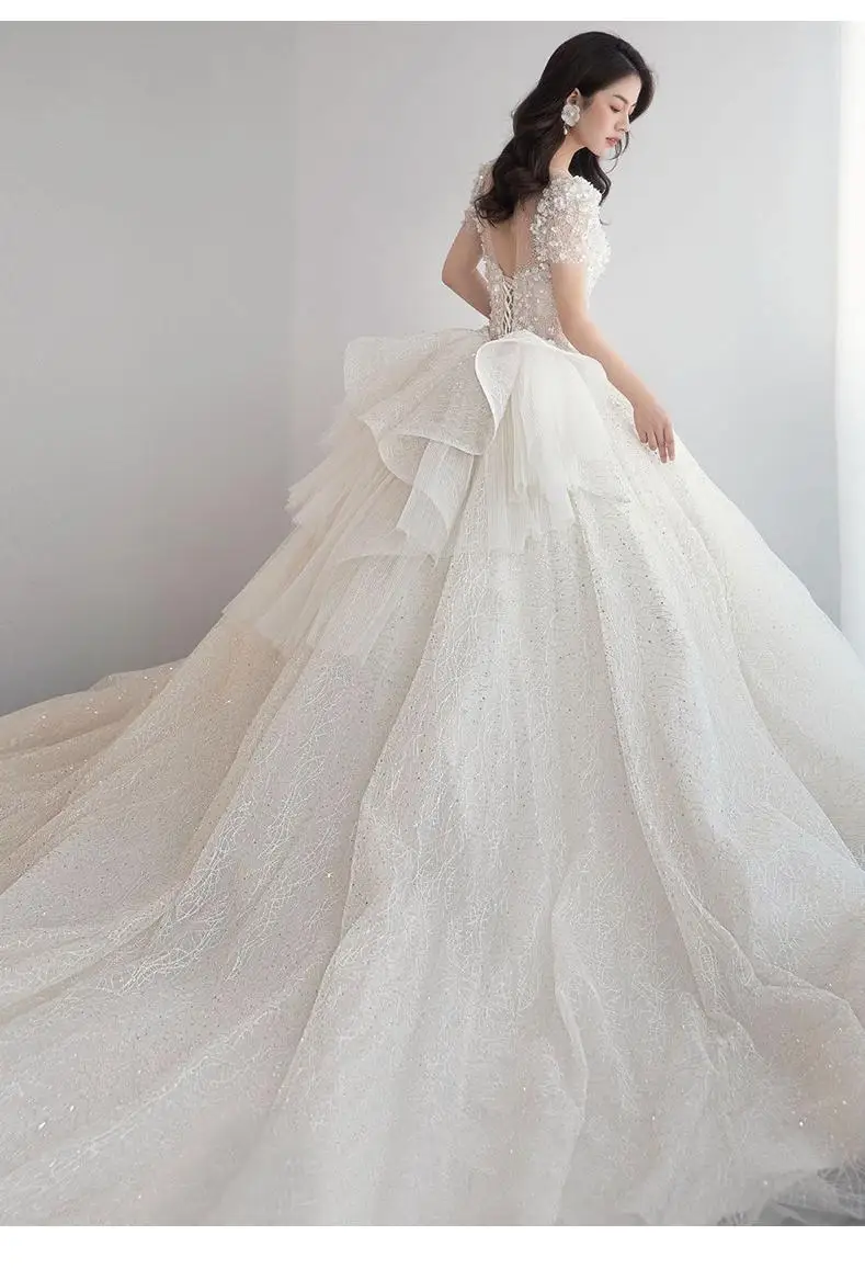 Luxury Short Sleeve Wedding Dress 2026 New Bridal Dress V Neck Beading Shinning Ball Gown Sweep Train Vestido Noiva Customized
