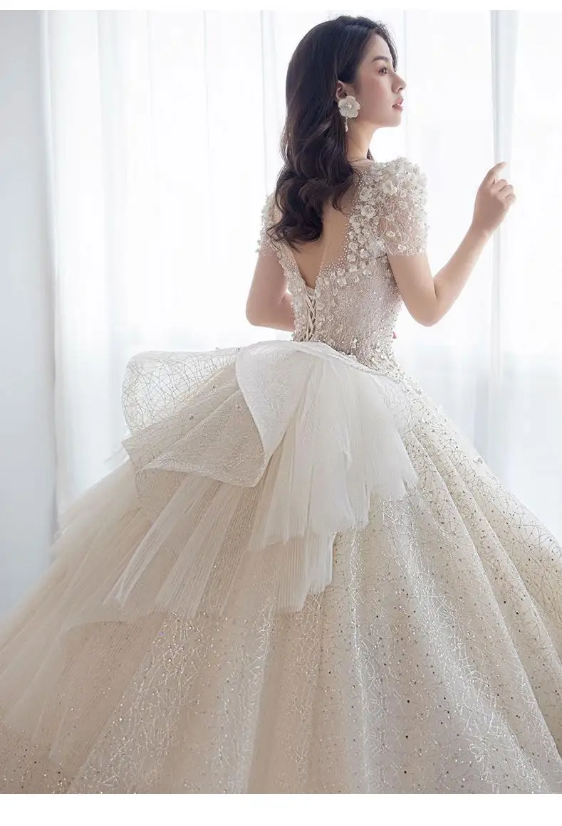 Luxury Short Sleeve Wedding Dress 2026 New Bridal Dress V Neck Beading Shinning Ball Gown Sweep Train Vestido Noiva Customized