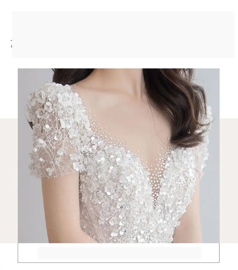 Luxury Short Sleeve Wedding Dress 2026 New Bridal Dress V Neck Beading Shinning Ball Gown Sweep Train Vestido Noiva Customized