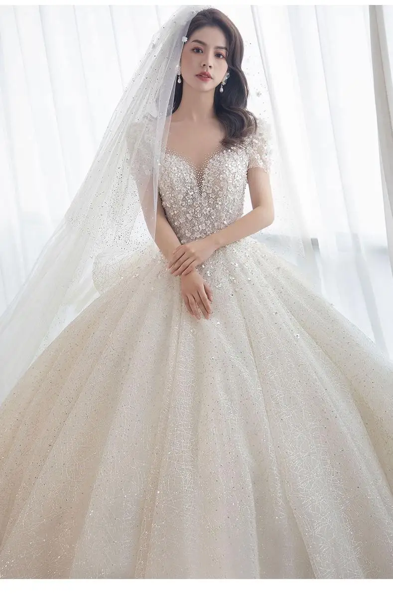 Luxury Short Sleeve Wedding Dress 2026 New Bridal Dress V Neck Beading Shinning Ball Gown Sweep Train Vestido Noiva Customized