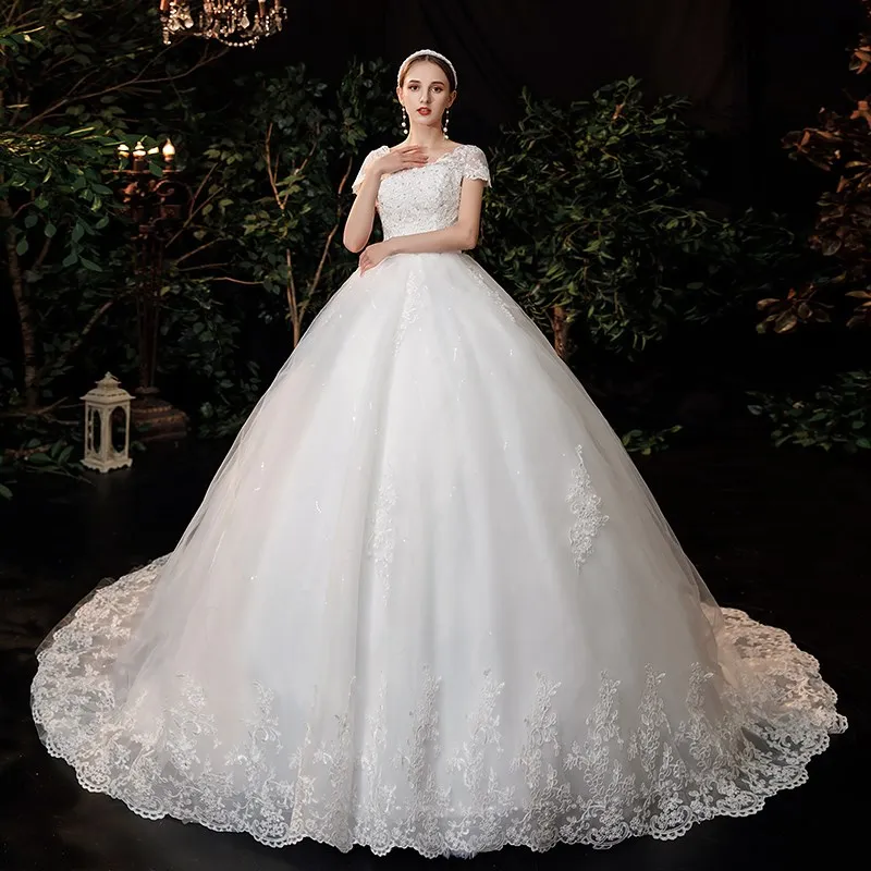 2026 Luxury Lace V Neck Ball Gown Wedding Dresses Short Sleeve Princess Illusion Applique Bridal Gowns Casamento Customized