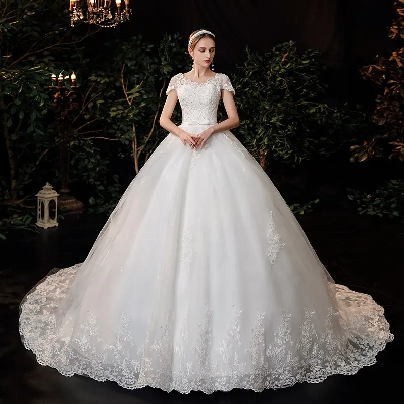 2026 Luxury Lace V Neck Ball Gown Wedding Dresses Short Sleeve Princess Illusion Applique Bridal Gowns Casamento Customized